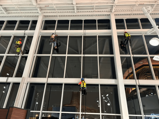 Why rope access beats lifts in busy spaces like airports