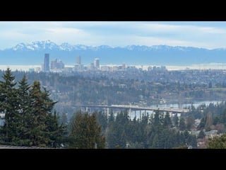 Link Light Rail on Bridge with Seattle and the Olympics in the Background – YouTube