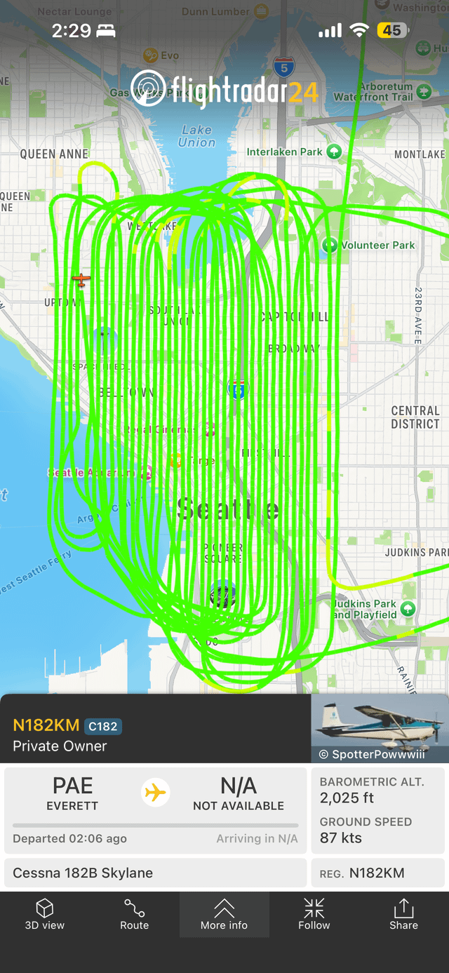 Cessna plane doing perfectly spaced loops over Seattle around 2AM