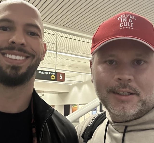 Tate in SeaTac taking a selfie because he thinks it’s a MAGA hat