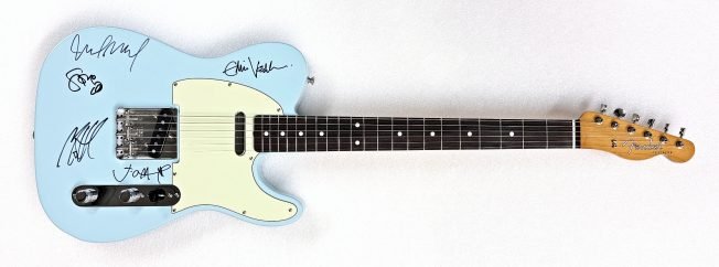 Arbor Heights Elementary is raising money to bring back music. You can bid on Pearl Jam-signed items