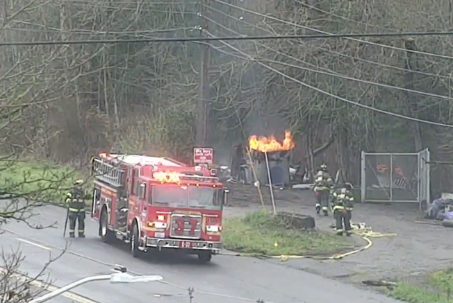 UPDATE: Roadside fire near bottom of Highland Park Way Hill