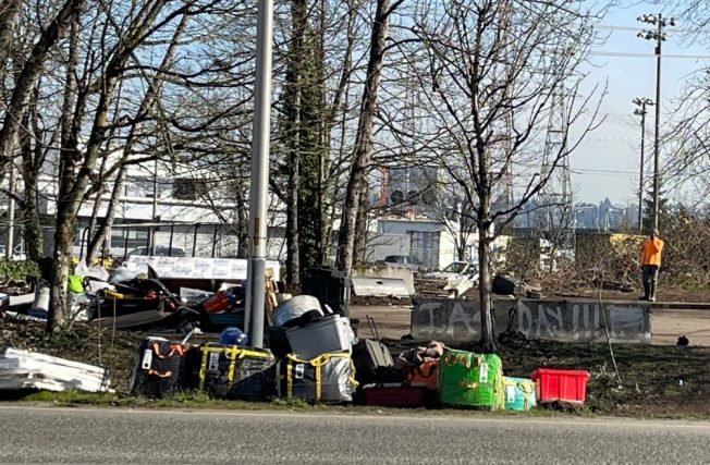 Cleanup at West Marginal Way encampment near future RV/tiny house site