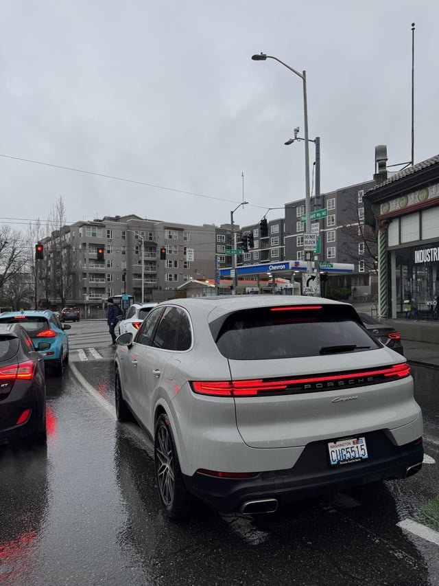 Porsche decides they can use the bike lane, almost causes a crash on 45th and Roosevelt
