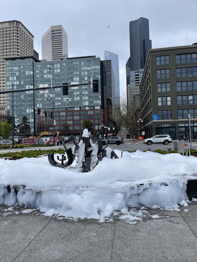 The fountain at the ferry terminal is overflowing with soap suds … again