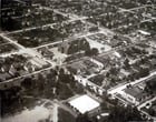 Aerial view of Admiral District, c.1930, with Lafayette Elementary School looming in the center of the photo. The school would be demolished following an earthquake in 1949.