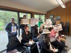 protesters at Hunt’s Point Town Hall yesterday confront Mayor Joe Sabey, whose Sabey corporation leases office space to I.C.E.