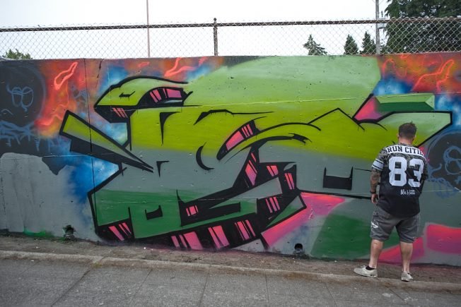 FOLLOWUP: Multiple artists painting at ‘West Side Wall’