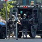SPD SWAT on the way to use a battering ram in Cap Hill