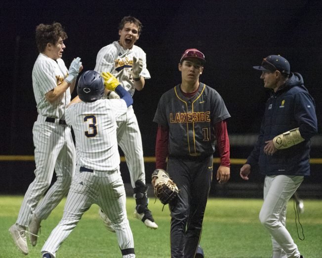 PHOTOS: West Seattle HS moves ahead in baseball postseason after a walkoff win