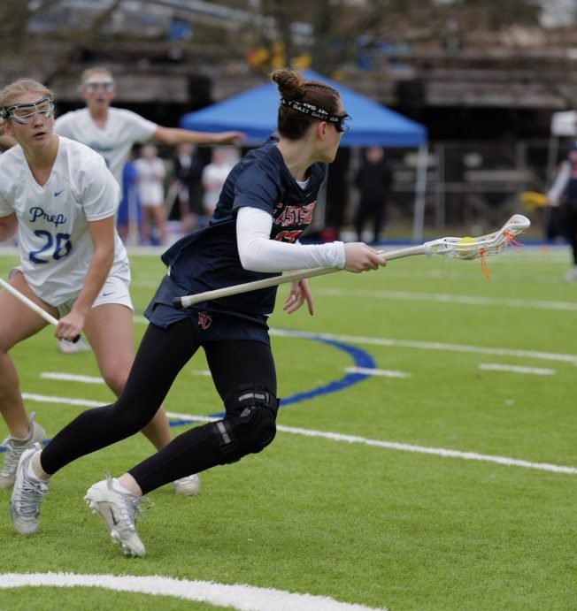 SPORTS: Two lacrosse players from West Seattle help their schools win state championships