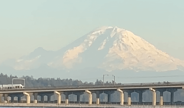 some Sound Transit fan with a real zoom lens want to come back and get this shot of the crosslake light rail in front of Mount Rainier