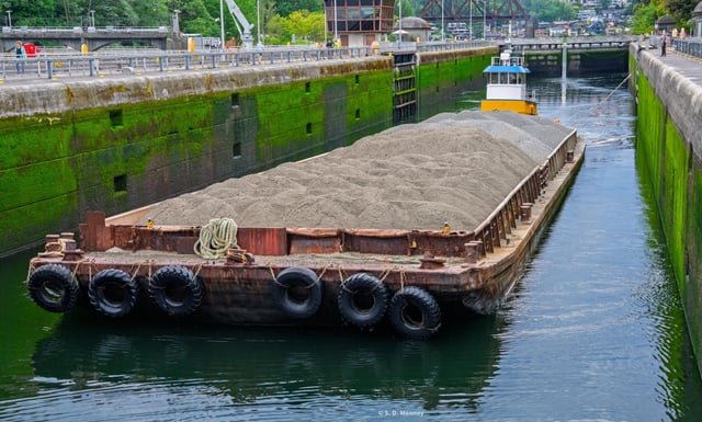Sand and gravel barge coming into the big lock at the Ballard (Hiram M. Chittenden) Locks yesterday during a walk.