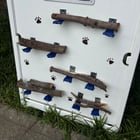 Update on Queen Anne stick library: covered corners of metal brackets with duct tape