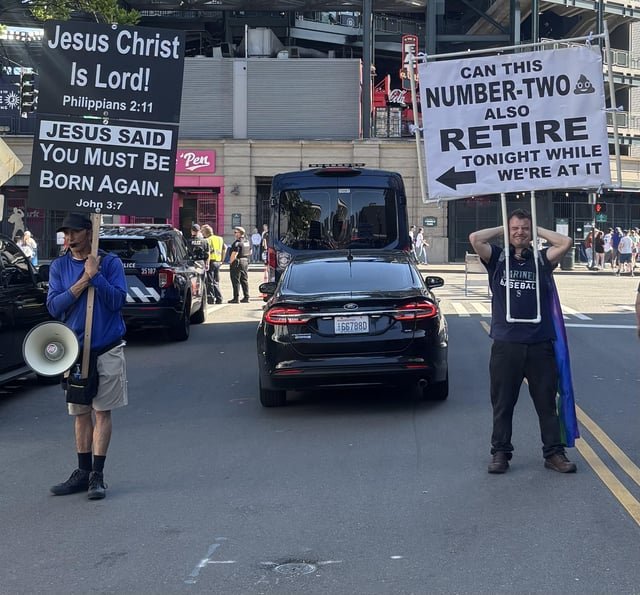 with the 90-decibel street preacher outside the Randy Johnson number retirement Mariners game