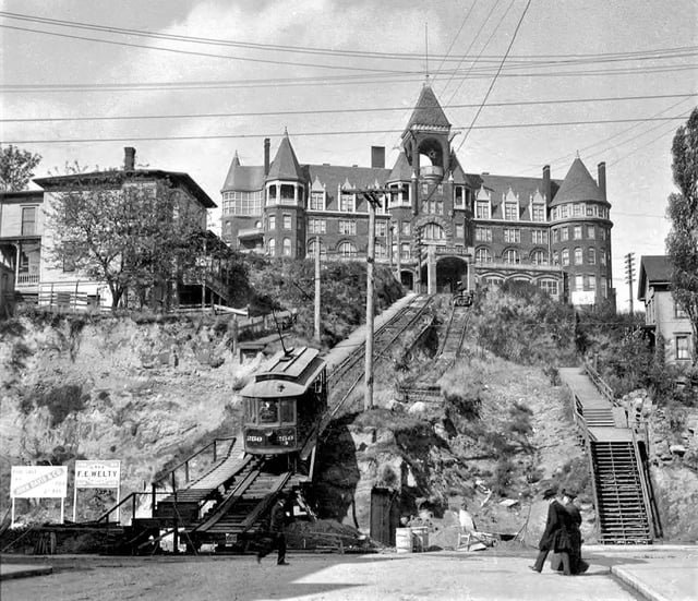 TIL that Seattle used to have another hill, ‘Denny Hill’, that had a big castle-like hotel on it. The hotel was mostly unused and empty for years, and then in 1907 they blasted away most of the hill it was sitting on (the ‘Denny Regrade’).