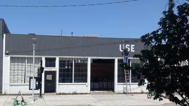 The sign for the old Bickersons Brewhouse is being removed