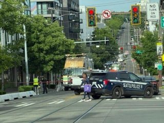 Bicyclist hit by recycling truck at 12th and Yesler — UPDATE: Thurgood Marshall Elementary teacher remembered