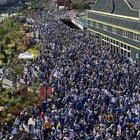 The Bonsai and Herzegovina fans march to their match against Qatar