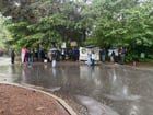 Seattle Against War protesting in the rain at Adam Smith’s house, in the countdown to when the anti-residential-protest ordinance goes into effect