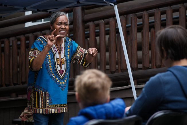 FOURTH OF JULY SCENE: Log House Museum storytelling