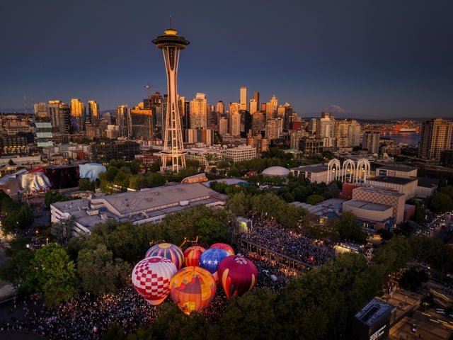 Wow. This is beautiful. Love the Space Needle with hot air balloons below it and Rainier in the background.