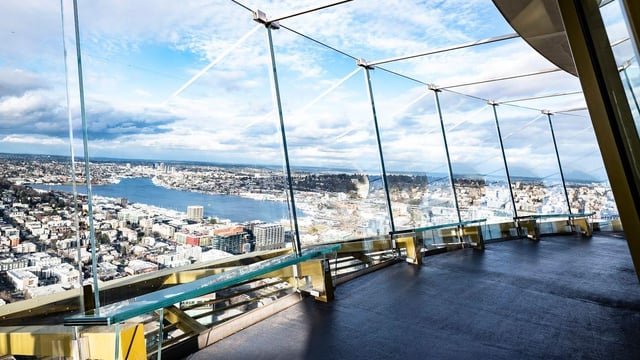 Two people breach Space Needle glass barriers, reportedly BASE jump in video