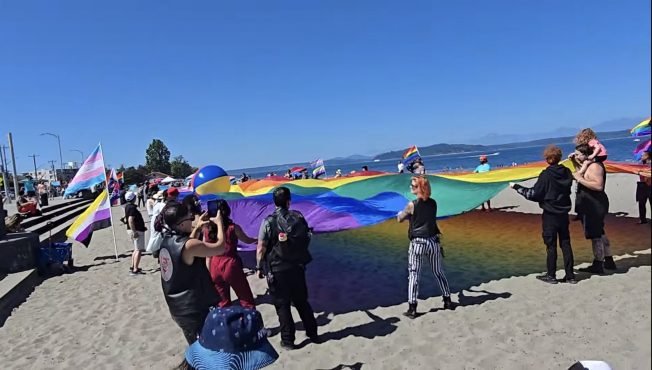 Volunteers needed Saturday for flag celebration in advance of Alki Beach Pride 2026