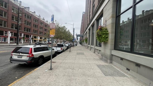 Shootout outside Pioneer Square bar hits cars, business; at least 1 person wounded