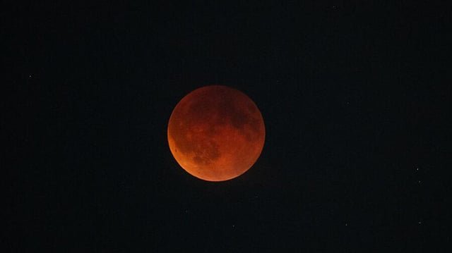 Head to your rooftops for 9:12pm peak viewing of the Blood Moon eclipse