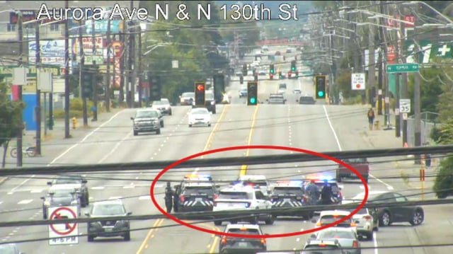 Driver arrested after falling asleep in the middle of Aurora Avenue with a gun on his lap