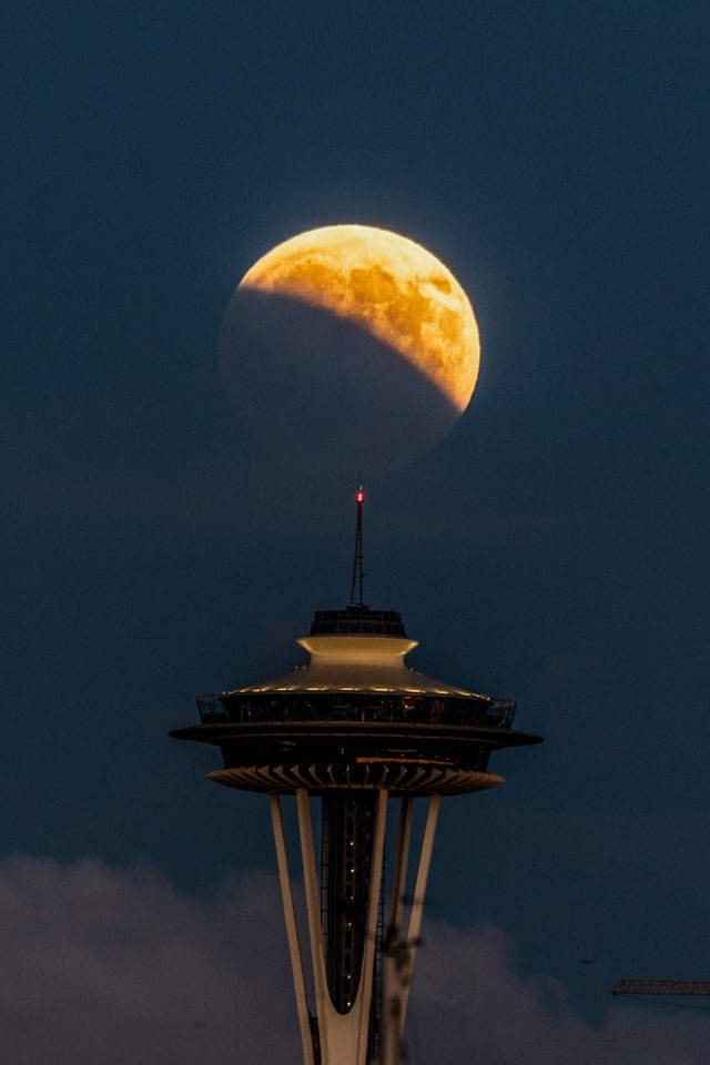 Tonight’s lunar eclipse behind the Space Needle