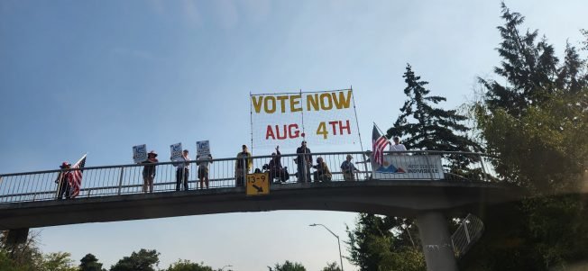 ELECTION 2026: Sign waves’ reminder that your ballot’s shelf life is running out