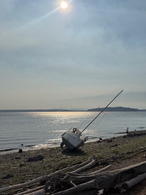 Another sunset sight: Still-beached boat