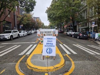 Amid ‘SDOT KILLS SMALL BUSINESS’ signs, city denies permit for advocate community group’s street party