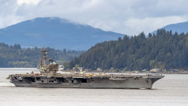 Aircraft carrier USS Ronald Reagan heading out (photos added)