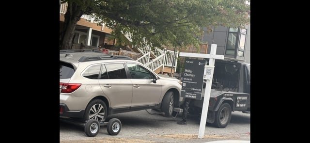 Your car was towed for blocking a driveway
