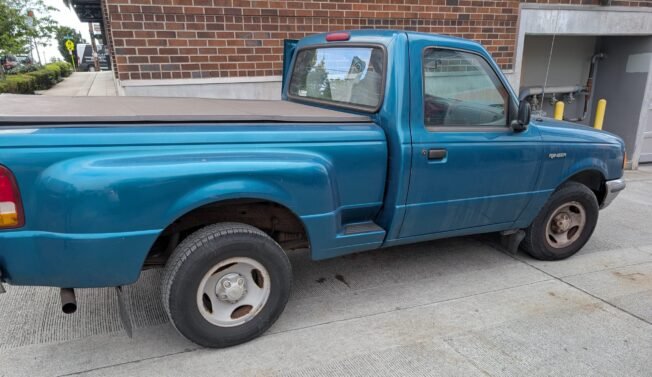 WEST SEATTLE CRIME WATCH: Green Ford Ranger stolen by thieves in blue Ford Mustang