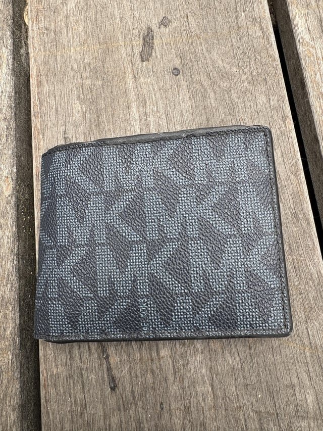 Found this wallet outside CH station. If you can tell me the name on the ID, we can its return.